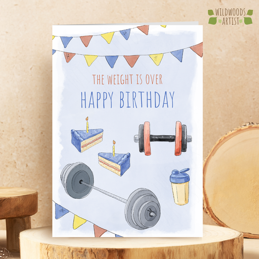Gym Birthday Card, featuring watercolour illustrations of dumbbells, barbell weights, birthday cake and a protein shake, with the fun birthday message on he card saying 'the weight is over - happy birthday'