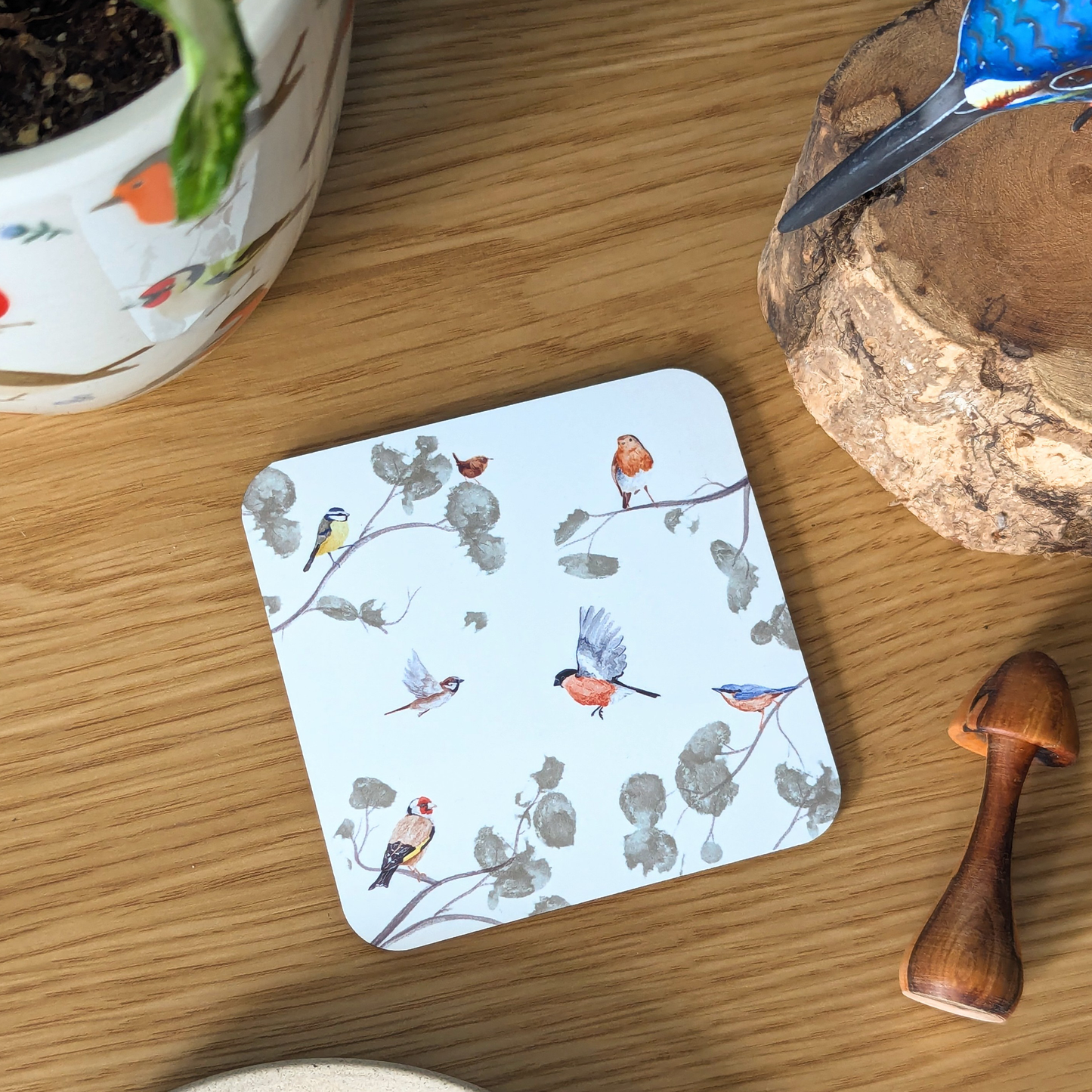 Coaster with British wild bird design on a wooden and cork base